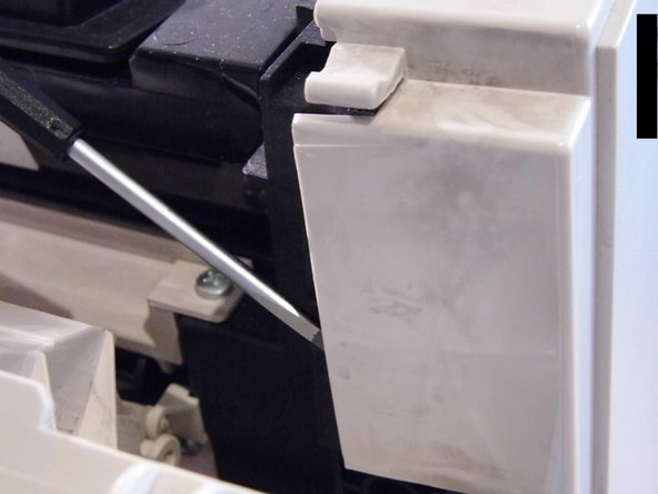 Replace Kyocera FS-1010 sponge rubber, Remove the side cover: crwdns2935265:05crwdnd2935265:02crwdnd2935265:03crwdne2935265:0