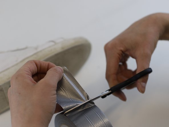 How to Repair a Hole in a Shoe Sole, Temporarily seal the outsole hole: crwdns2935265:05crwdnd2935265:02crwdnd2935265:03crwdne2935265:0