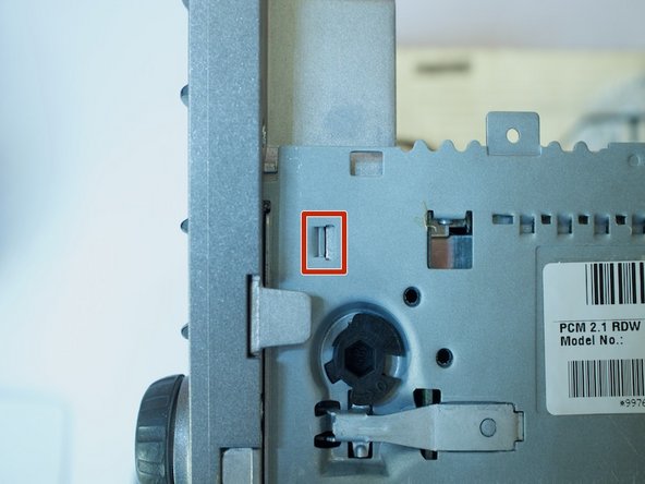 Porsche 997.1 PCM 2.1 Screen Replacement, Identifying the tab retainers keeping the facia connected to the chassis: step 7, image 3 of 3