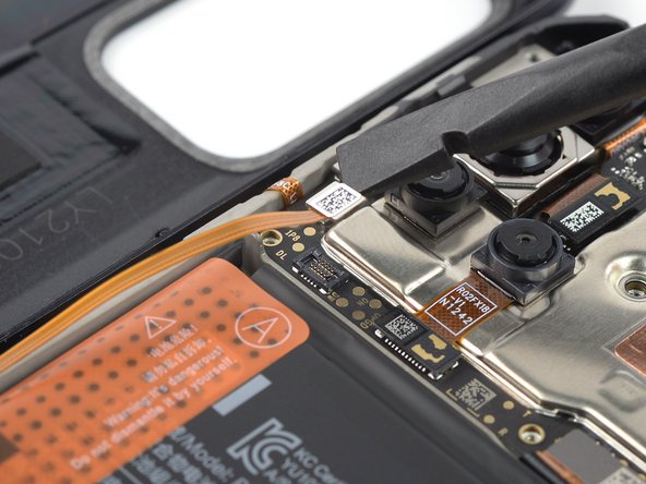 Xiaomi Redmi Note 9T Screen Replacement, Disconnect the home and volume button cable: crwdns2935265:014crwdnd2935265:02crwdnd2935265:02crwdne2935265:0