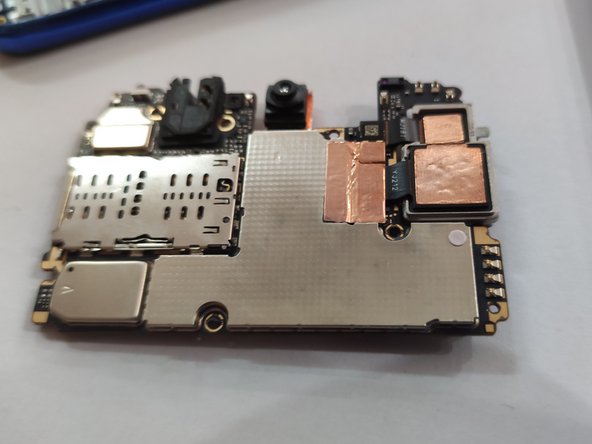 Xiaomi Redmi Note 7 Screen and Metal case Replacement, Clean the thermal paste: step 12, image 2 of 2