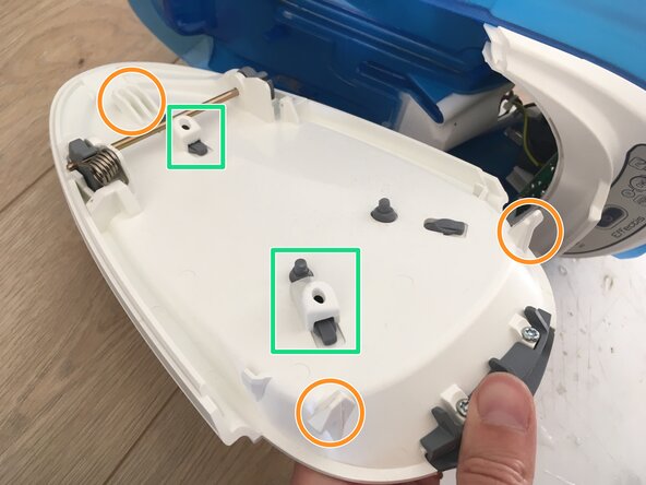 Tefal GV6760 Effectis Steam Generator Iron Disassembly, Release the tabs and remove top cover: crwdns2935265:03crwdnd2935265:02crwdnd2935265:03crwdne2935265:0