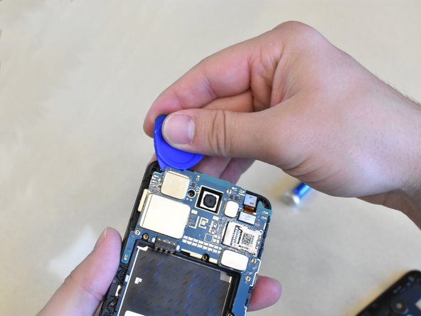 LG Rebel 4 LTE Disassembly, Remove the Motherboard: crwdns2935265:06crwdnd2935265:02crwdnd2935265:03crwdne2935265:0