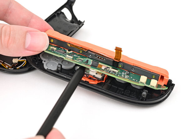 Joy-Con 2 (Right) Joystick Replacement, Install the board: crwdns2935265:031crwdnd2935265:02crwdnd2935265:03crwdne2935265:0