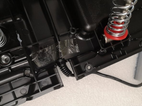 Thrustmaster T3PM RJ12 main cable Replacement, Remove tape: crwdns2935265:05crwdnd2935265:02crwdnd2935265:03crwdne2935265:0