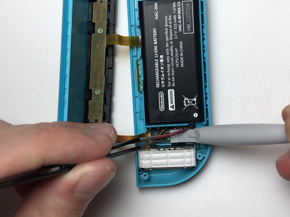 Left Joy-Con Charging Rail Replacement: crwdns2935265:015crwdnd2935265:02crwdnd2935265:02crwdne2935265:0