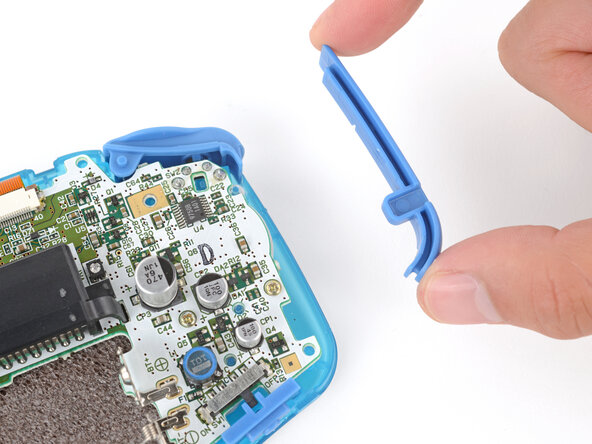 How to Reshell Your Game Boy Advance, Install the side bumpers: crwdns2935265:032crwdnd2935265:01crwdnd2935265:03crwdne2935265:0