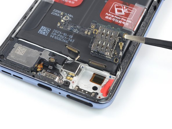 OnePlus Nord 2 5G Daughterboard Replacement, Fold over the daughterboard: crwdns2935265:026crwdnd2935265:02crwdnd2935265:02crwdne2935265:0