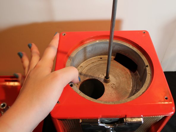 How to Fix a Stuck Quarter in a  Candy Machine: step 5, image 1 of 2