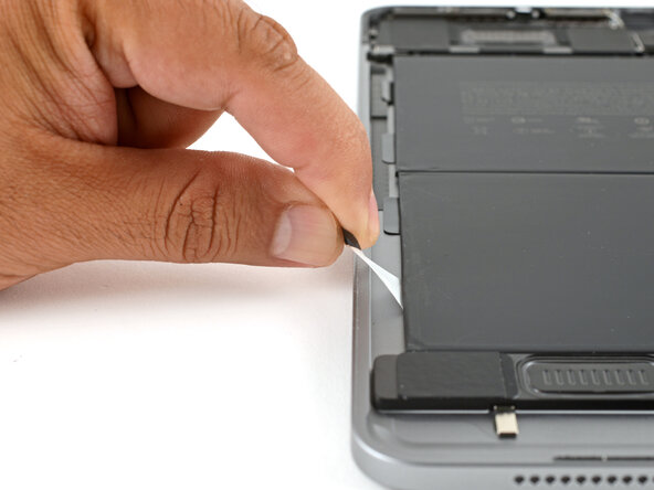 iPad Air 6 11" Battery Replacement, Remove the stretch-release adhesives: step 24, image 1 of 3