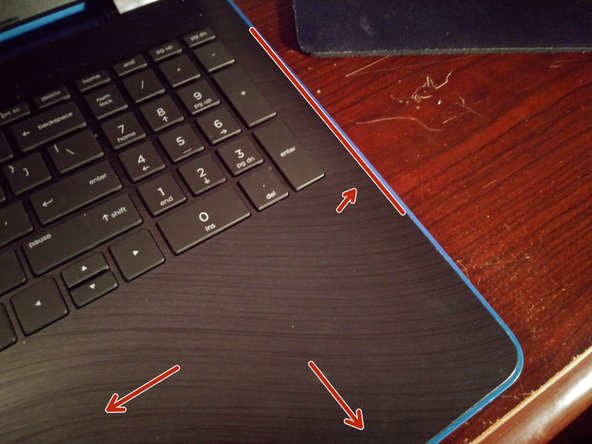 HP 15-bw00xx Guide., Remove the back cover.: step 2, image 2 of 2