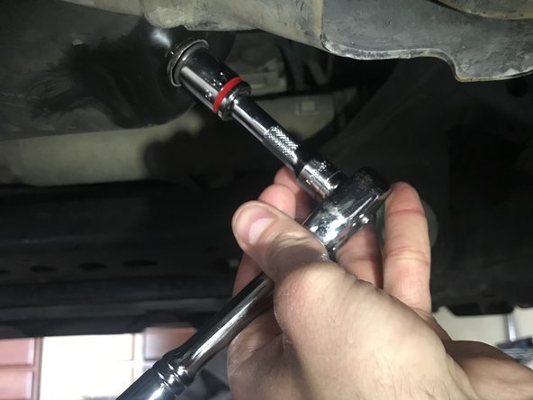 Remove any gasket material from the drain plug and replace the sealing gasket.  Screw the oil drain plug back into oil pan . Tighten until snug, do not over tighten