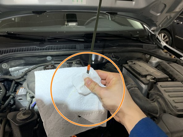 2011-2018 VW Jetta Oil & Filter Replacement, Clean Oil Dipstick: step 15, image 1 of 3
