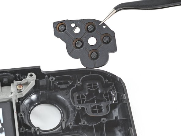 Steam Deck Front Shell Replacement, Remove the D-pad membrane: crwdns2935265:088crwdnd2935265:02crwdnd2935265:02crwdne2935265:0