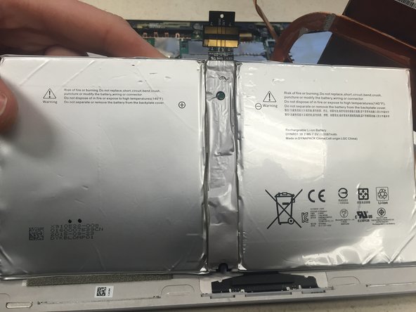 Also be careful to protect the motherboard from shorts while placing the cable for the new battery.