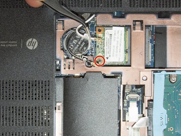 Wireless card replacement, Disconnect the antenna cables & unfasten the screw: crwdns2935265:05crwdnd2935265:02crwdnd2935265:03crwdne2935265:0