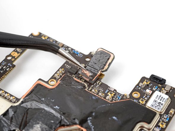 Motorola Edge (2022) Motherboard Replacement, Peel back the camera tape: step 33, image 2 of 2
