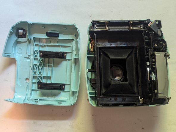 Fujifilm Instax Mini 9 Camera Shell Replacement, Remove the Rear Cover: crwdns2935265:013crwdnd2935265:03crwdnd2935265:03crwdne2935265:0