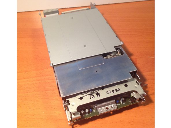 Apple 3.5 Drive External Floppy Drive Teardown, Removing the Floppy Mechanism From the Chassis: crwdns2935265:09crwdnd2935265:02crwdnd2935265:03crwdne2935265:0