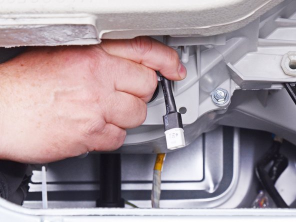 LG Front Load Washing Machine Temperature Sensor Replacement, Remove the temperature sensor: crwdns2935265:029crwdnd2935265:02crwdnd2935265:03crwdne2935265:0