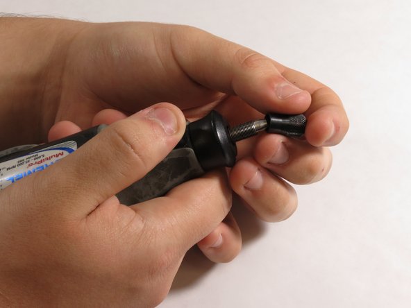 Dremel MultiPro 395 Armature Replacement, Removing the chuck cap: crwdns2935265:05crwdnd2935265:03crwdnd2935265:03crwdne2935265:0