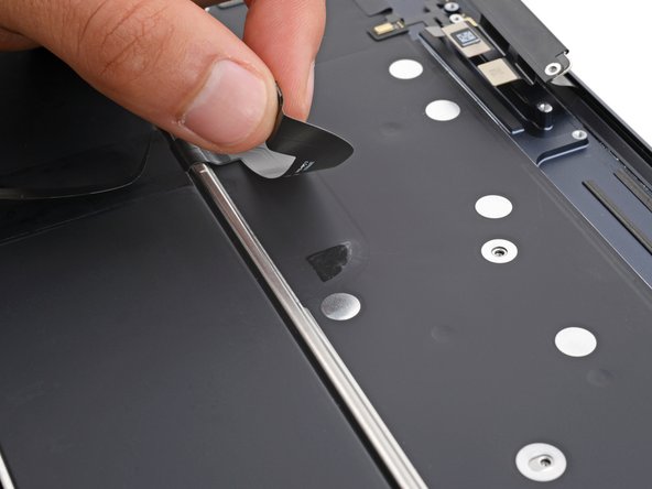 MacBook Air 15" 2023 Battery Replacement, Separate the battery cable adhesive: crwdns2935265:039crwdnd2935265:02crwdnd2935265:02crwdne2935265:0