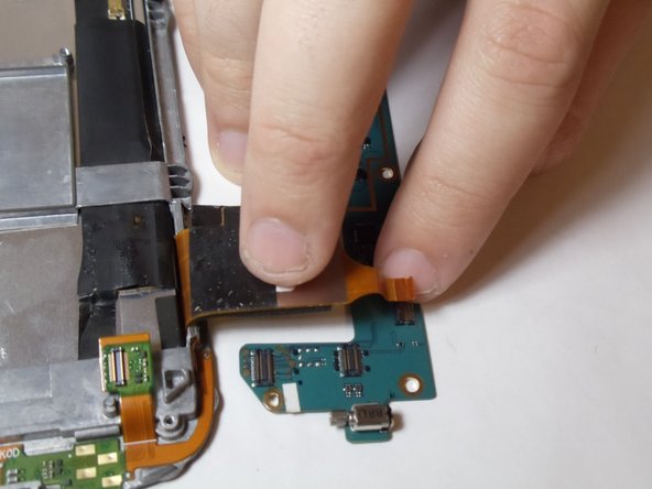 Lenovo IdeaTab S2109A-F System Board Replacement, Disconnecting the final connector of the System Board.: crwdns2935265:07crwdnd2935265:03crwdnd2935265:03crwdne2935265:0