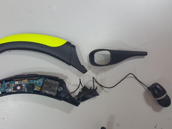 LG Tone Active HBS-850 Speaker Replacement, Remove Hidden Speaker Screw: crwdns2935265:05crwdnd2935265:02crwdnd2935265:02crwdne2935265:0