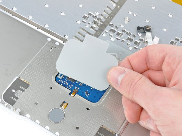 MacBook Core 2 Duo Upper Case Cable Replacement: crwdns2935265:022crwdnd2935265:02crwdnd2935265:02crwdne2935265:0