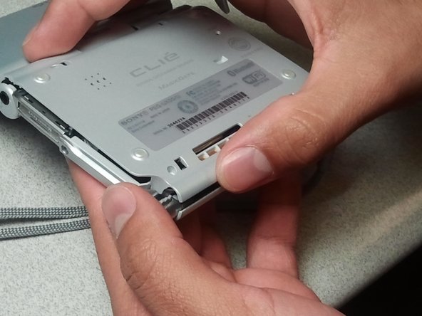 Sony Clie PEG-UX50 Rear Case Replacement: crwdns2935265:03crwdnd2935265:02crwdnd2935265:02crwdne2935265:0