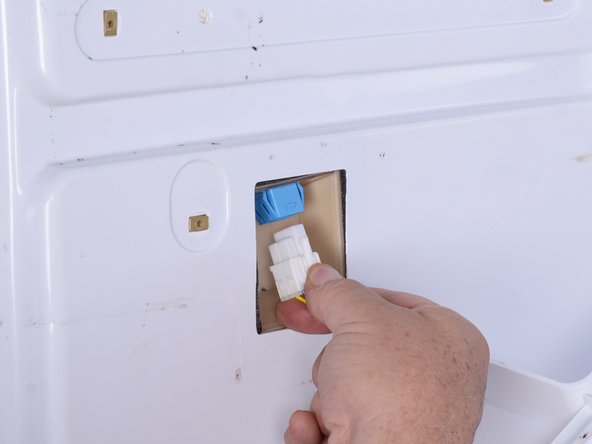 LG Refrigerator Evaporator Fan Replacement, Disconnect the drawer switch and remove the lower slide: crwdns2935265:011crwdnd2935265:02crwdnd2935265:03crwdne2935265:0