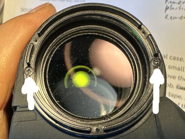 Canon Binocular 10x30 IS Battery cover Replacement, Removing the bottom cover, part B: crwdns2935265:02crwdnd2935265:01crwdnd2935265:02crwdne2935265:0