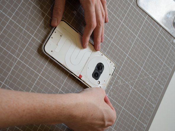 Nothing Phone (2a) Battery Replacement, Replace silver sticker in the top right: crwdns2935265:033crwdnd2935265:02crwdnd2935265:02crwdne2935265:0