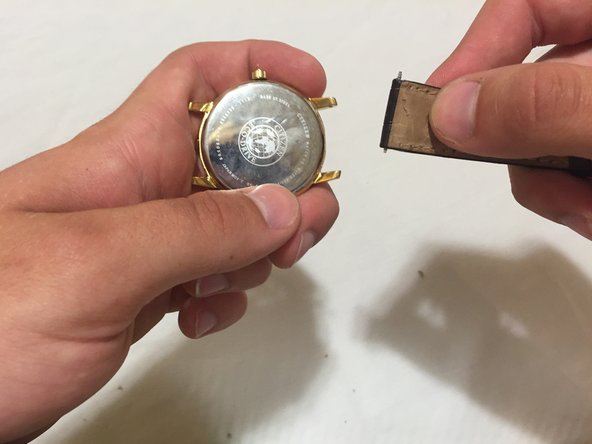 Repeat steps 2-4 to remove the other end of the watch strap.