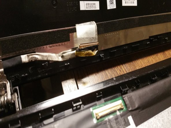 HP 15-r136wm Screen Assembly Replacement, Disconnect Cable: crwdns2935265:06crwdnd2935265:02crwdnd2935265:02crwdne2935265:0