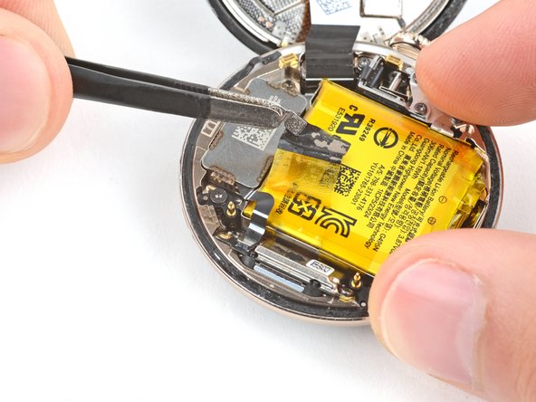 Google Pixel Watch 2 Vibration Motor Replacement, Peel up the vibration motor cable tape: step 12, image 3 of 3