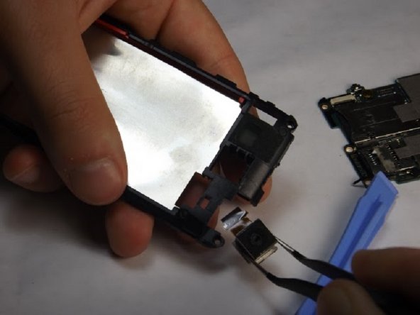 HTC Freestyle Rear Facing Camera Replacement, Locate and remove camera: crwdns2935265:012crwdnd2935265:02crwdnd2935265:02crwdne2935265:0