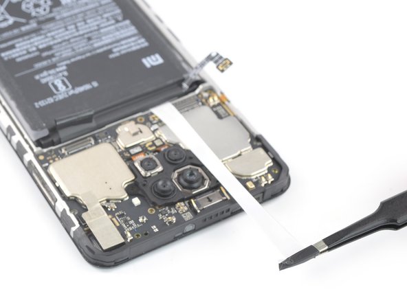 Xiaomi Redmi Note 9 Battery Replacement, Remove the pull-tabs: crwdns2935265:018crwdnd2935265:03crwdnd2935265:03crwdne2935265:0