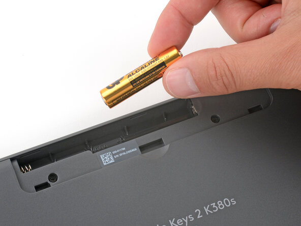 How to Open Your Logitech Pebble Keys 2 K380s Keyboard, Remove the batteries: passo 3, immagine 3 di 3