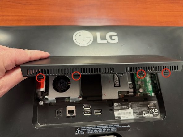 LG Chromebase 22" Teardown, Open the Rear Hatch: crwdns2935265:02crwdnd2935265:02crwdnd2935265:02crwdne2935265:0