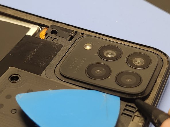 Revvl 6 Pro 5G Screen Replacement, Remove the Camera Lens: crwdns2935265:09crwdnd2935265:03crwdnd2935265:03crwdne2935265:0