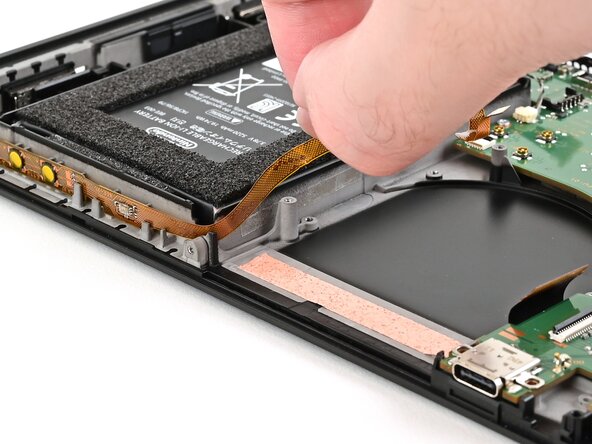 Nintendo Switch 2 Button Board Replacement, Route the button board cable: crwdns2935265:041crwdnd2935265:01crwdnd2935265:03crwdne2935265:0