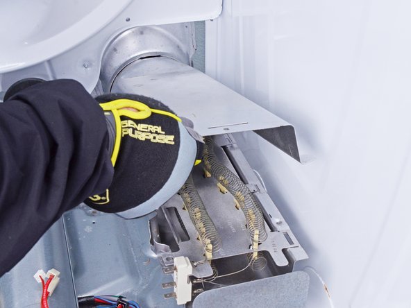 Whirlpool WED87HED Dryer Heating Element Testing and Replacement, Remove the heater housing cover: crwdns2935265:055crwdnd2935265:02crwdnd2935265:03crwdne2935265:0