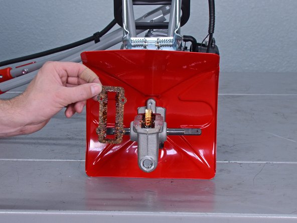 Mantis Tiller 7940 (2017) Tine Shaft Roller Bearings Replacement, Remove the worm housing gasket: crwdns2935265:011crwdnd2935265:02crwdnd2935265:02crwdne2935265:0
