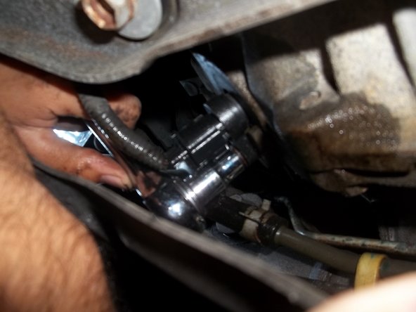 2003-2004 Infiniti G35 Sedan Crankshaft Position Sensor Replacement, Remove Bolt on Crankshaft Position Sensor: crwdns2935265:012crwdnd2935265:02crwdnd2935265:03crwdne2935265:0