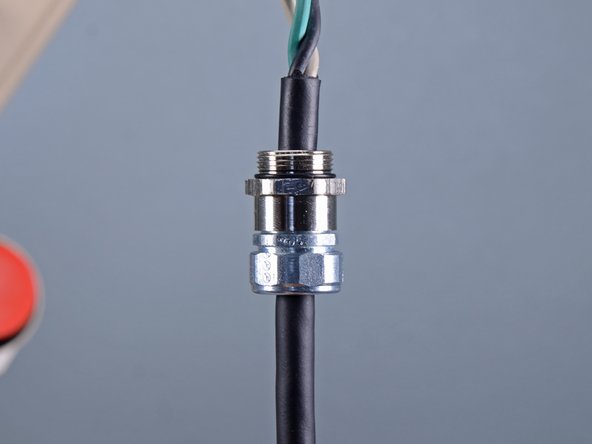 EDCO Disk Grinder 50200-HD Power Cord Replacement, Transfer the strain relief fitting to the new power cord: crwdns2935265:021crwdnd2935265:02crwdnd2935265:02crwdne2935265:0