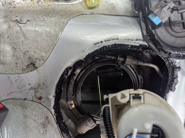 Hyundai Accent Fuel Pump Replacement, Remove the pump from the fuel tank: step 21, image 3 of 3