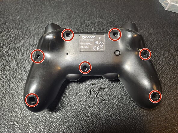 Nacon Asymmetric Wireless PS4 Controller Teardown, Remove the shell screws: crwdns2935265:01crwdnd2935265:01crwdnd2935265:01crwdne2935265:0