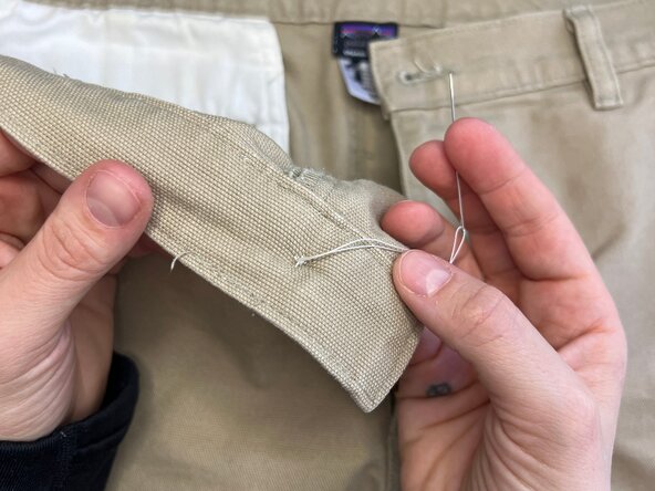 Sew a Button onto Heavy Fabric, Continue stitching the button: crwdns2935265:07crwdnd2935265:03crwdnd2935265:03crwdne2935265:0