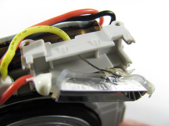 Removing Olympus FE-210 Flash Assembly: crwdns2935265:010crwdnd2935265:02crwdnd2935265:03crwdne2935265:0